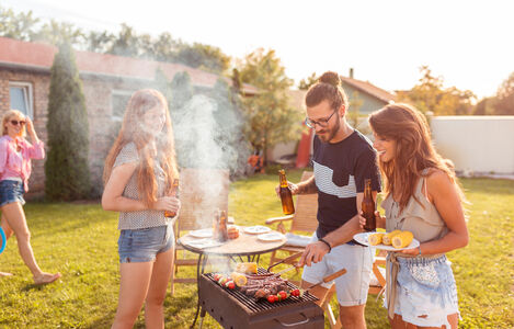 Group,Of,Cheerful,Young,Friends,Having,A,Backyard,Barbecue,Party,